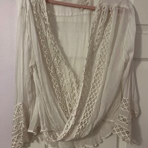 Beautiful cotton crossover blouse with sparkly beads woven throughout